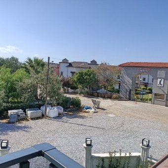 Ayvalık Güzelbahçe Evlerinde Satılık Lüks Deniz Manzaralı 1+1 Sıfır Daire.