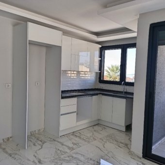 Ayvalık Güzelbahçe Evlerinde Deniz Manzaralı 2+1 Sıfır Satılık Lüks Daire.
