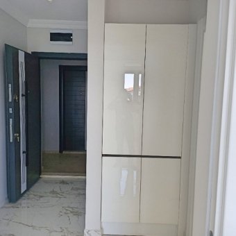 Ayvalık Güzelbahçe Evlerinde Deniz Manzaralı 2+1 Sıfır Satılık Lüks Daire.