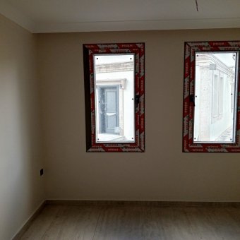 Ayvalık Altınova Merkezde 4+1 Sıfır Satılık Taş Villa.