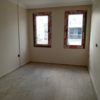 Ayvalık Altınova Merkezde 4+1 Sıfır Satılık Taş Villa.