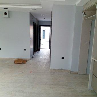 Ayvalık Altınova Merkezde 4+1 Sıfır Satılık Taş Villa.