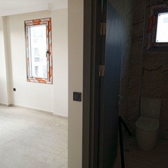 Ayvalık Altınova Merkezde 4+1 Sıfır Satılık Taş Villa.